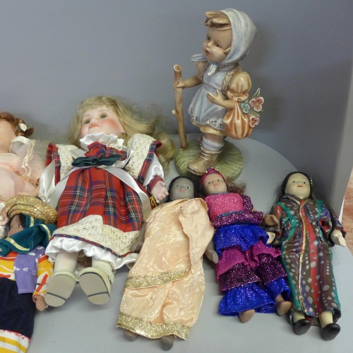 1142 - A collection of dolls including many from different countries