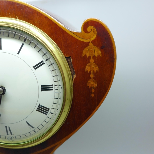 603 - An Edwardian stylised balloon clock with inlaid case, 25cm