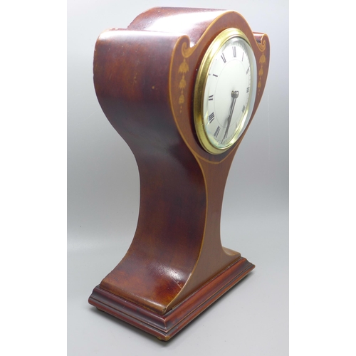 603 - An Edwardian stylised balloon clock with inlaid case, 25cm