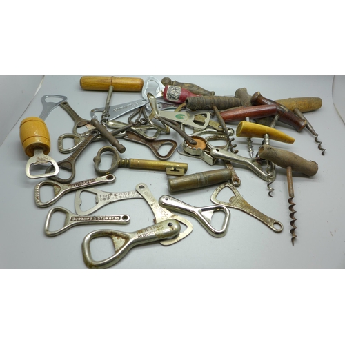 614 - A collection of corkscrews and other bottle openers