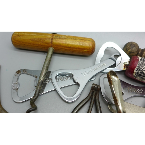 614 - A collection of corkscrews and other bottle openers