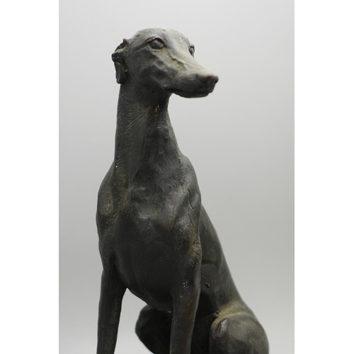 617 - A model of a lurcher on a marble plinth, 19cm