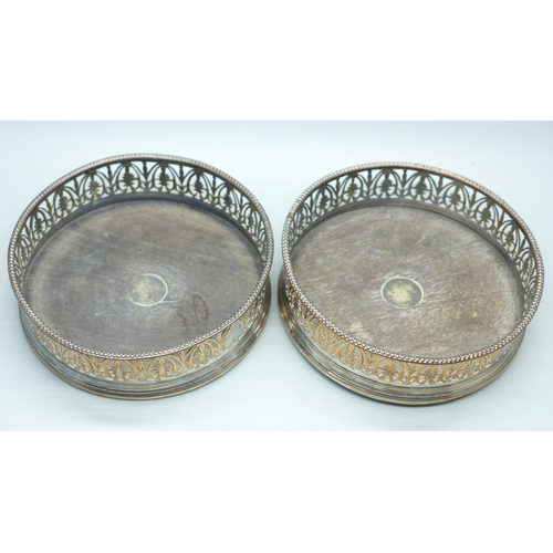 625 - Two Georgian silver plate on copper wine coasters