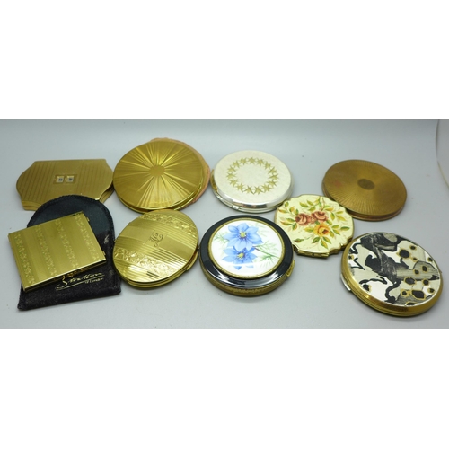 635 - Nine compacts including Stratton and Kigu, and a handbag mirror