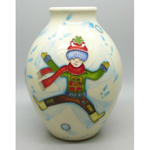 639 - A Moorcroft Snow Angel vase, Helen Dale, boxed, 13cm