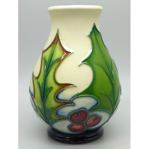 640 - A Moorcroft Holly & Berry vase, Philip Gibson, 2004, boxed, 10cm