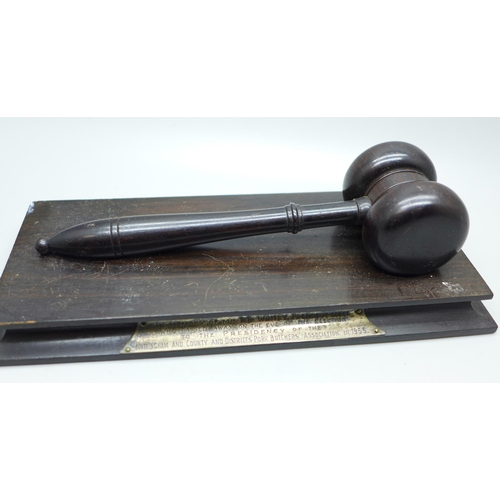 645 - A presentation gavel with base, marked Nottingham and County and District's Pork Butcher's Associati... 