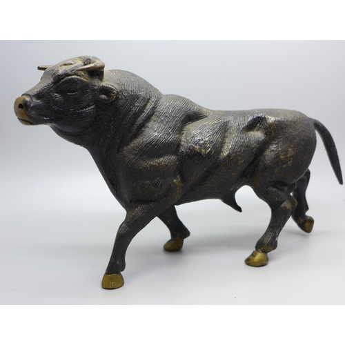 646 - A bronze cold painted model of a bull, length 24.5cm