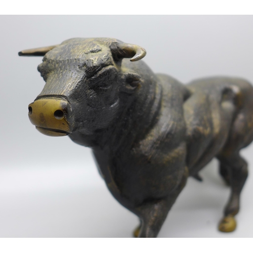 646 - A bronze cold painted model of a bull, length 24.5cm