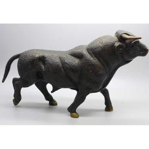 646 - A bronze cold painted model of a bull, length 24.5cm