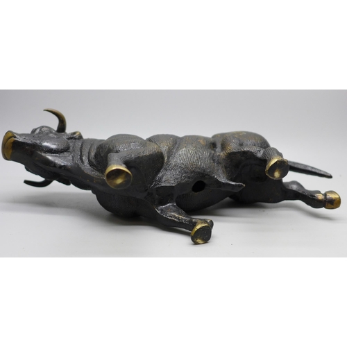 646 - A bronze cold painted model of a bull, length 24.5cm