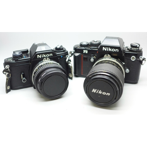 651 - Two Nikon cameras, EM and F3