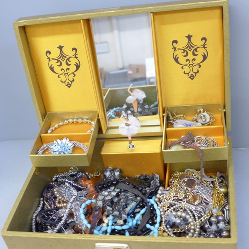 653 - A jewellery box and costume jewellery