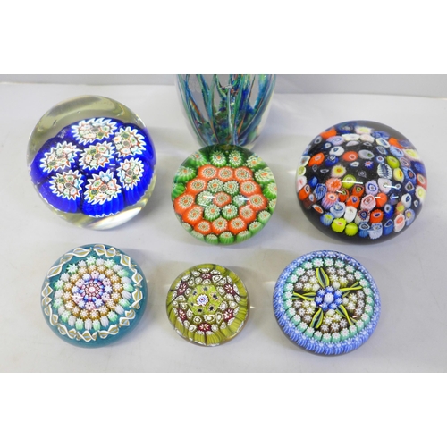 658 - Seven glass paperweights