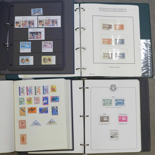 692 - Stamps; four albums of stamps