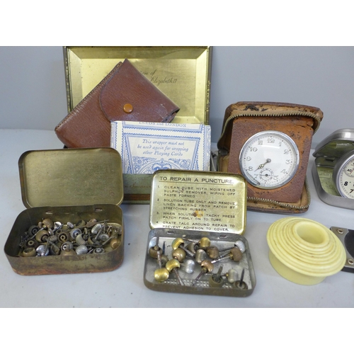 693 - Watchmaker's tweezers, movement holders, travel clock, etc.