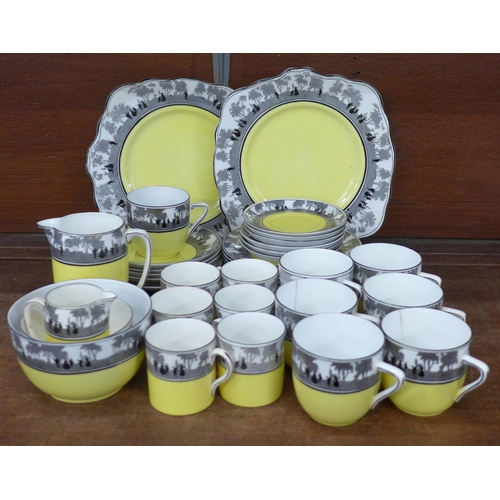 694 - Foley Silhouette china tea and coffee ware, yellow with woodland scene around rim, some a/f, (UK no.... 