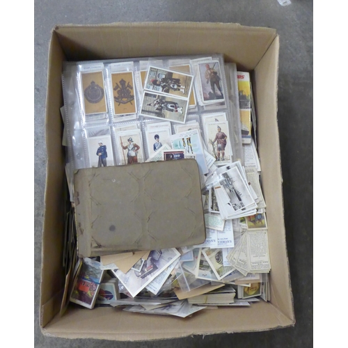 707 - Cigarette cards; cigarette and trade cards in albums, on pages and loose