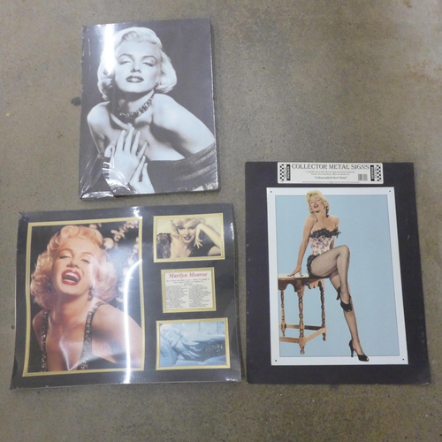 710 - A box of paperback books on Marilyn Monroe and other Marilyn Monroe items including a mug, calendars... 