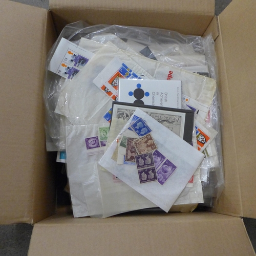 711 - Stamps; a box of GB stamps, covers, etc.