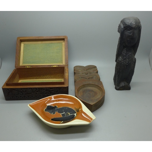 714 - A boomerang, Indian carved box, a Tunisian herb/medicine box, carved figure and carved model owl