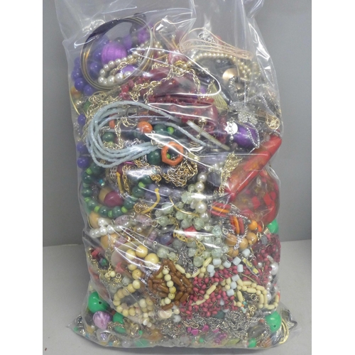 775 - Two bags of costume jewellery