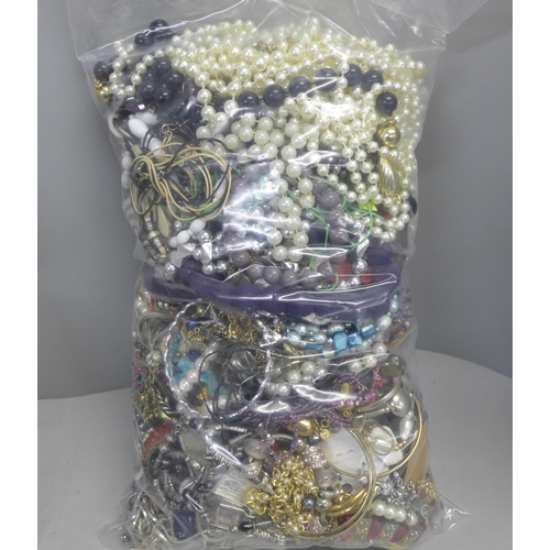 775 - Two bags of costume jewellery