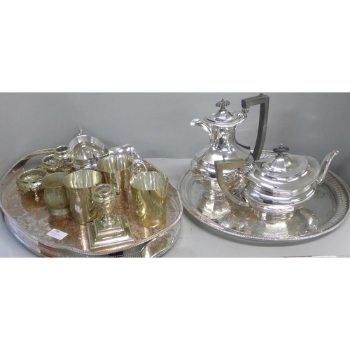 785 - Three George V silver plate half-pint mugs, a pair of silver plated candlesticks, a gallery tray, a ... 