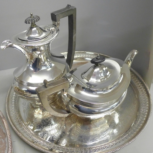 785 - Three George V silver plate half-pint mugs, a pair of silver plated candlesticks, a gallery tray, a ... 