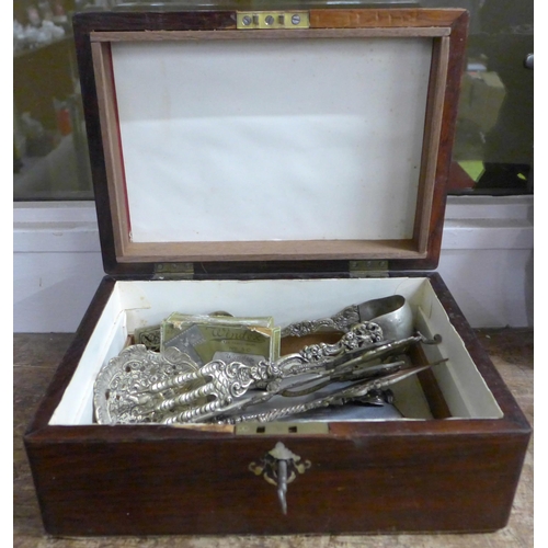 789 - A wooden box with mother of pearl inlay, two lighters, metalware and a safety razor