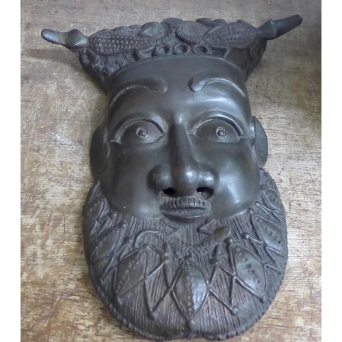 791 - A bronze wall mask of an African chief, height 29cm