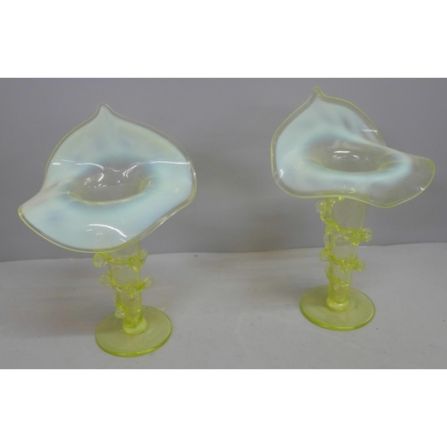 793 - A matching pair of Victorian vaseline glass pulpit vases, 8