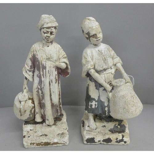 800 - A pair of plaster garden figures, 34cm