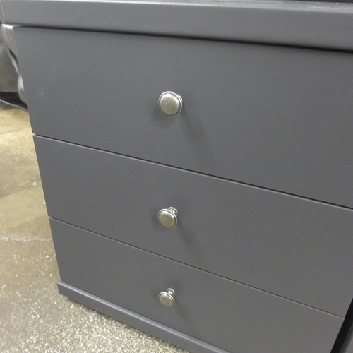 1327 - A pair of slate grey bedside chests * This lot is subject to VAT