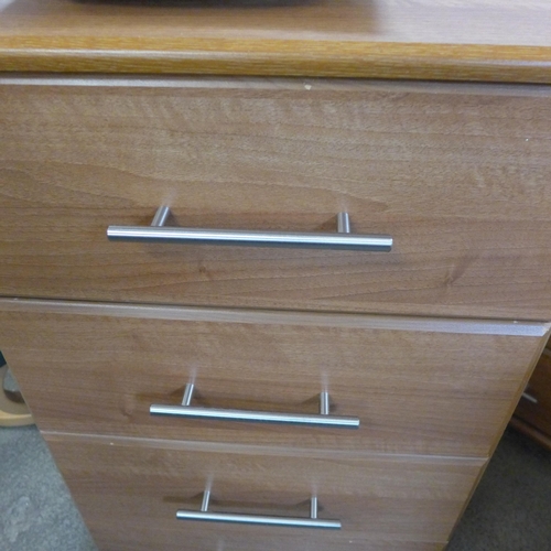 1600 - Two teak effect four drawer chests