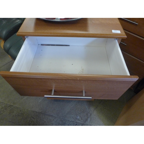 1600 - Two teak effect four drawer chests