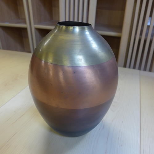 1606 - A metal multi-coloured vase