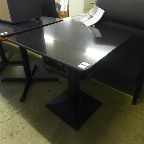 1617 - A black marble pub table with X base