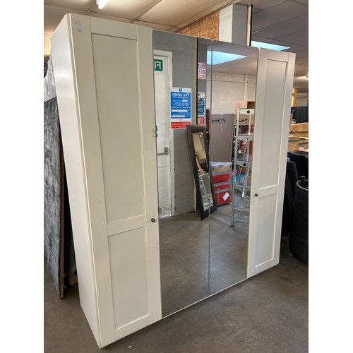 1342 - A four door part mirrored wardrobe * This lot is subject to VAT