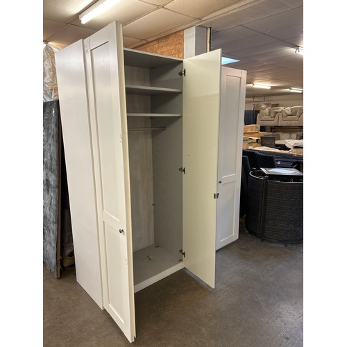 1342 - A four door part mirrored wardrobe * This lot is subject to VAT