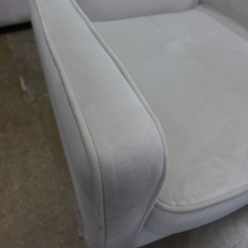 1381 - A sandstone velvet upholstered swivel side chair