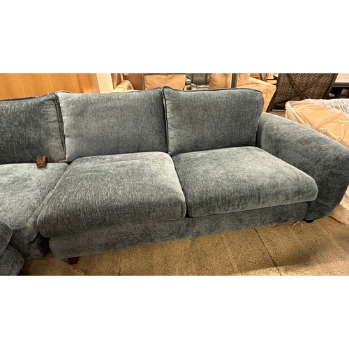 1569 - A blue textured weave upholstered corner sofa - damaged legs