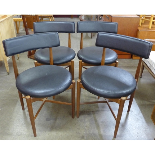 10 - A set of four G-Plan Fresco teak and black vinyl dining chairs