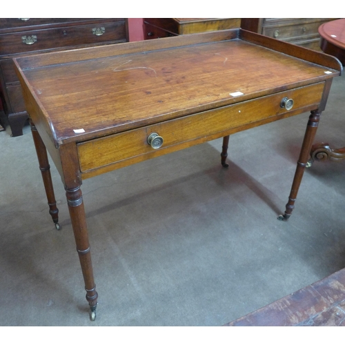 110 - A George IV mahogany single drawer writing table