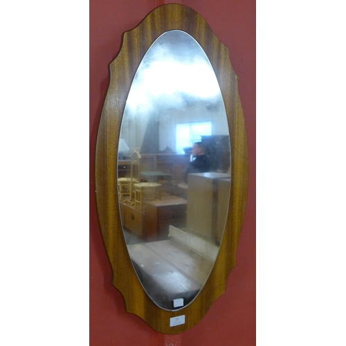 12 - A teak framed mirror