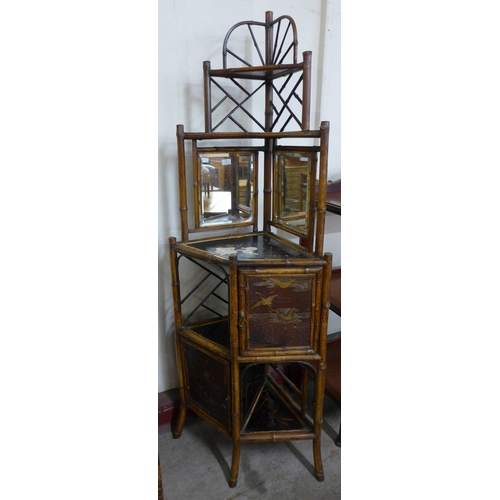 120 - A Victorian Aesthetic Movement bamboo corner cabinet