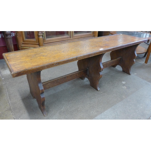 124 - An early 20th Century oak bench