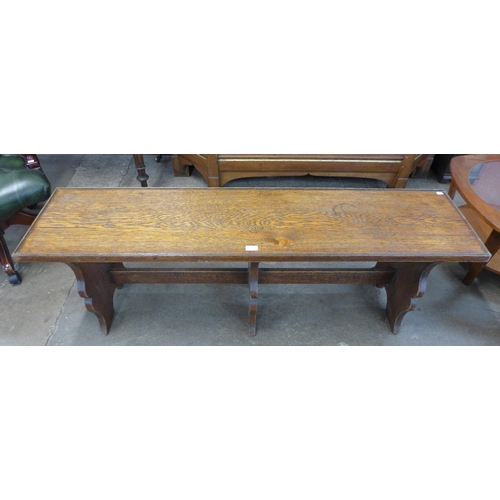 124 - An early 20th Century oak bench