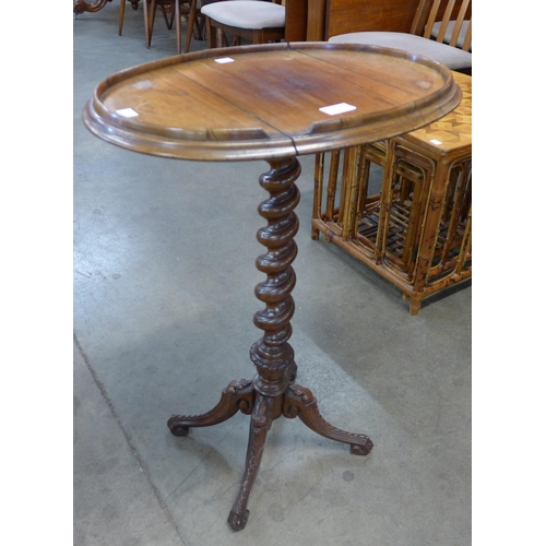 128 - A Victorian rosewood barleytwist wine table