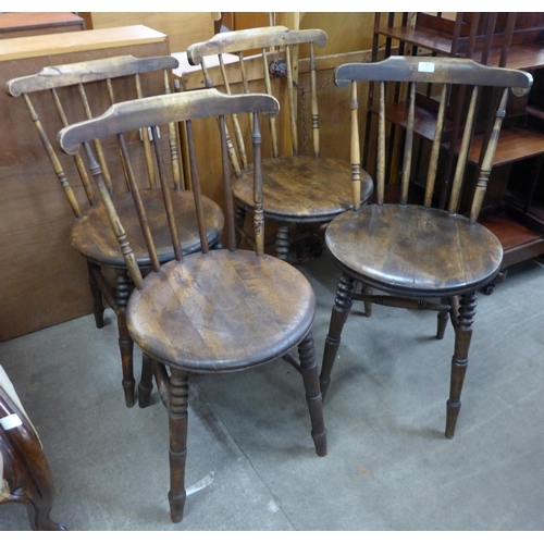 133 - A set of four Victorian beech penny seat kitchen chairs